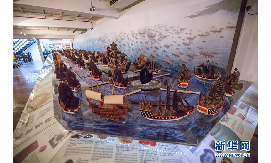 这是2018年6月9日在马来西亚马六甲郑和文化馆拍摄的郑和船队再现场景。  新华社记者 朱炜 摄