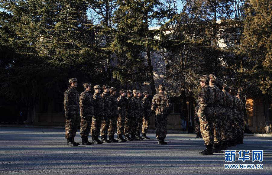1月13日，中国国家乒乓球队成员在训练中。当日，中国国家乒乓球队在北京某军事体育训练中心开始为期一周的军训。新华社记者王东震摄