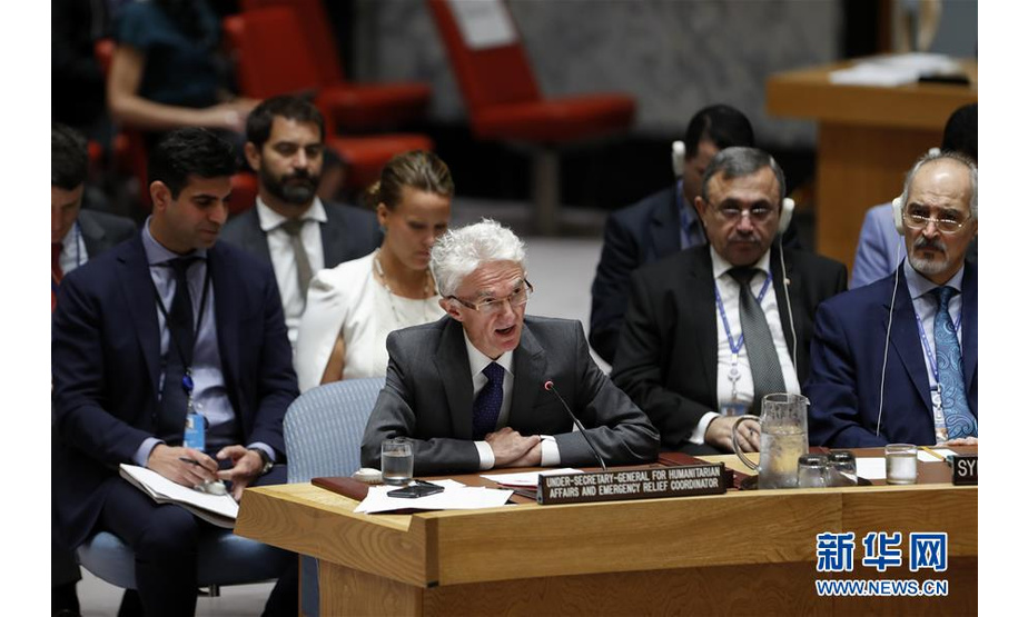 9月18日，在位于纽约的联合国总部，联合国负责人道主义事务的副秘书长马克·洛科克（前排左）在安理会叙利亚政治和人道局势公开会上发言。 新华社记者 李木子 摄