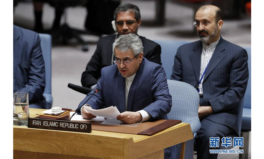 9月18日，在位于纽约的联合国总部，伊朗常驻联合国代表霍什鲁（前）在安理会叙利亚政治和人道局势公开会上发言。 新华社记者 李木子 摄