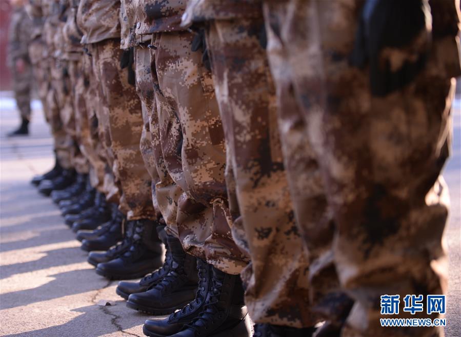 1月13日，中国国家乒乓球队成员在训练中。当日，中国国家乒乓球队在北京某军事体育训练中心开始为期一周的军训。新华社发（侯昭康摄）